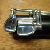 B-Foot, African Blackwood with Sterling SIlver keywork, Keycups are hand-made and soldered onto silver castings, Stainless steel rod-screws and blue steel needle springs, the Eb post is soldered onto the ferrul e which is held by locking screws