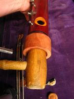 The cracks are now glued together and the timber is pushed close to round by the sleeve and a mallet